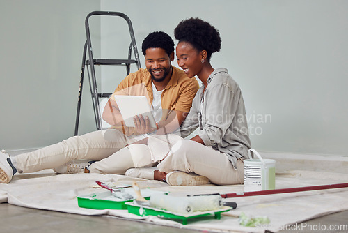 Image of Painting, tablet or black couple in home renovation, diy or house remodel online shopping together. Digital, ecommerce choices or African man on the internet with woman excited about family property