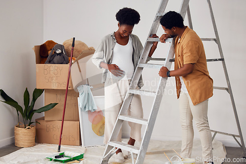 Image of Ladder, pregnancy or black couple in home renovation, diy or house remodel together in apartment. Lovely people, helping or African man and pregnant woman excited about baby or partnership as family