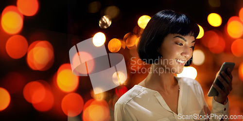 Image of Woman, phone texting and night mockup with smile, meme and communication by blurred background. Happy young executive, smartphone and readings for web email, social network app and online dating chat