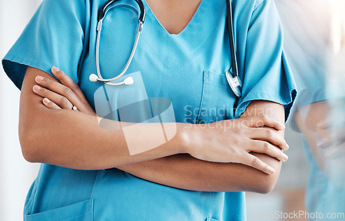 Image of Healthcare, closeup and proud, woman and doctor at hospital with arms crossed in medicine for health goal. Nurse, hands and professional surgeon ready for help and medical service, working at clinic