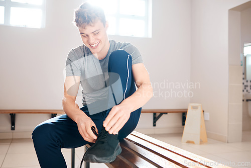 Image of Sports, tying shoes and man in locker room for training, fitness and gym workout. Exercise, health and start cardio with athlete and dressing sneakers for cardio, wellness or ready for practice