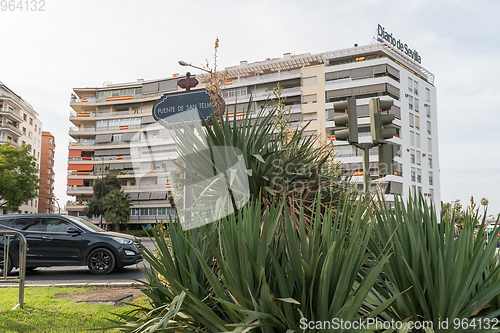 Image of Spanish flags are hung from the balconies