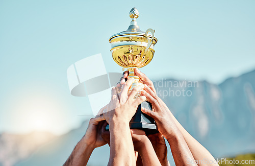 Image of Sports, champion and hands of team with trophy for achievement, goal and success together. Celebration, winner and people holding an awards cup after winning a sport competition or rugby tournament