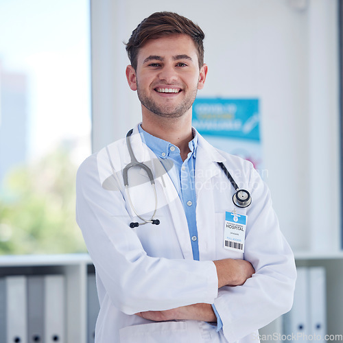 Image of Happy, healthcare and portrait of doctor at hospital proud, empowered and confident. Face, leader and male health expert with positive mindset, goal or medical innovation at clinic, smile and excited