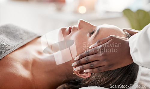 Image of Face massage, spa and skincare woman with luxury wellness, peace and calm for beauty treatment. Facial therapist and hands for person zen, healing and stress relief while relax on table in bokeh