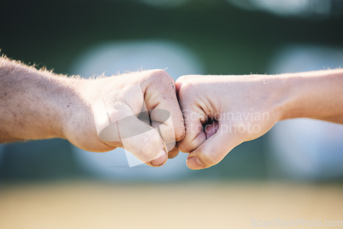 Image of Fist bump, hands and outdoor with touch, teamwork and greeting for respect, support and motivation. Man, woman and hand together for connection, partnership and team building for sport, deal or goal