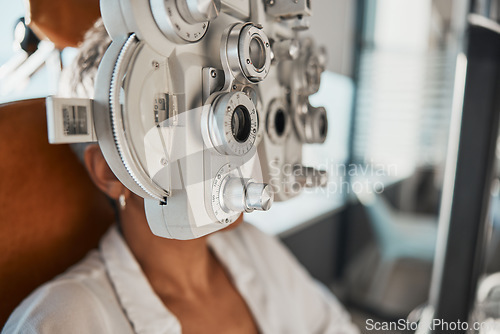 Image of Ophthalmologist phoropter, patient consultation or eye exam for vision, healthcare or wellness. Senior woman, ophthalmology care and health for eyes in office, hospital or store for vision assessment