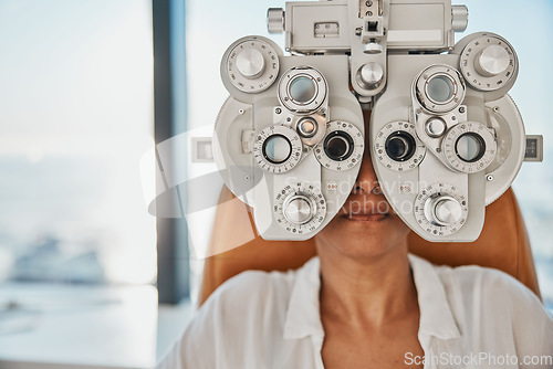 Image of Vision, eye exam and woman in optometry test for wellness, eyesight and optical assessment. Healthcare, optometrist consultation and patient with medical equipment, phoropter and lens for eyes