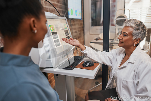 Image of Elderly ophthalmologist woman, computer and eye exam results with consultation, advice and smile. Optometrist, doctor and happy with African patient for analysis, consulting or medical help in office