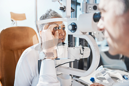 Image of Senior eye exam, glaucoma check and medical eyes test of elderly woman at doctor consultation. Vision, healthcare focus and old female patient with consulting wellness expert for lens and glasses