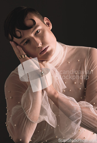 Image of Gender neutral, vintage fashion and portrait of person with designer clothing and faux pearls in studio. Isolated, black background and lgbtq or gay model with jewelry and creativity and non binary