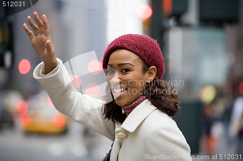 Image of Woman Hailing a Cab