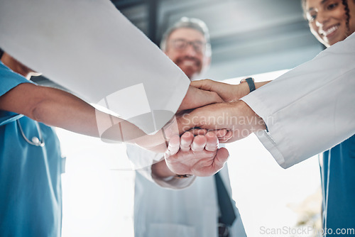 Image of Doctor, team and hands together in healthcare agreement, trust or partnership for success or unity at clinic. Group of medical experts piling hand in teamwork collaboration, achievement or goals