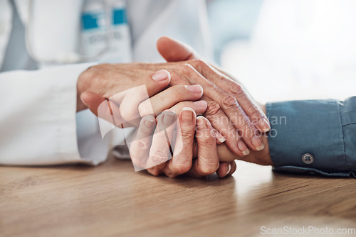 Image of Healthcare, care or doctor support holding hands of patient for trust, consulting or cancer news report. Medical, medicine or insurance nurse with wellness heart problem empathy comfort in hospital