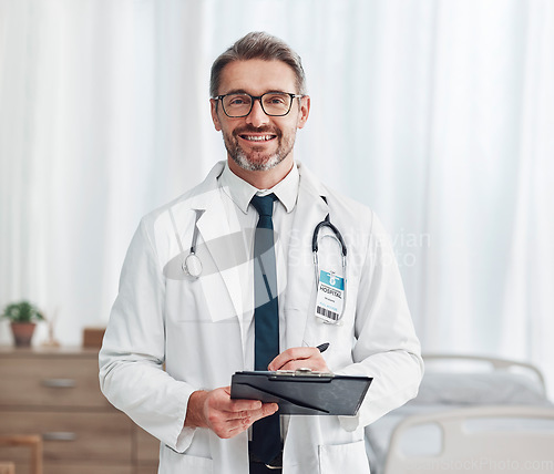 Image of Healthcare, leadership and portrait of doctor, man in hospital for support, success and help in medical work. Health, medicine and confident mature professional with stethoscope, smile and clipboard.