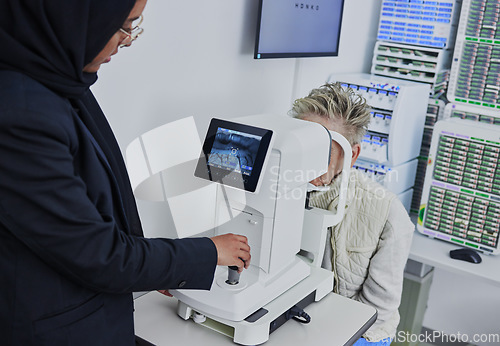 Image of Optometry, screen for eye exam and optician with patient for vision test, eyesight and optical assessment. Healthcare, ophthalmology and optometrist with medical camera for eyes scan of senior woman