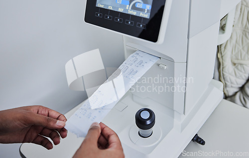 Image of Ophthalmology, healthcare and printing with hands of person and machine for medical, information or eye care. Lens, medicine and technology with expert and lensmeter for diagnostic, test or optometry