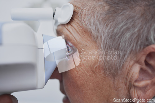 Image of Optometry, eye exam and medical with old woman and consulting for healthcare, vision or glaucoma. Ophthalmology, prescription and technology with senior patient and machine for test, check or results