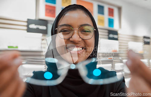 Image of Optometry, glasses and vision with portrait of Muslim woman for eye healthcare, retail and medical for you. Consulting, frame and smile with optician for prescription, medicine and treatment