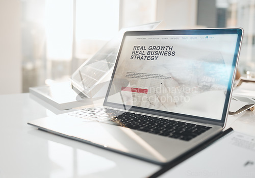 Image of Laptop screen, business strategy and table in office with solar panel in empty company workplace. Real growth, website and computer or pc on desk with information and ui for web or internet site.