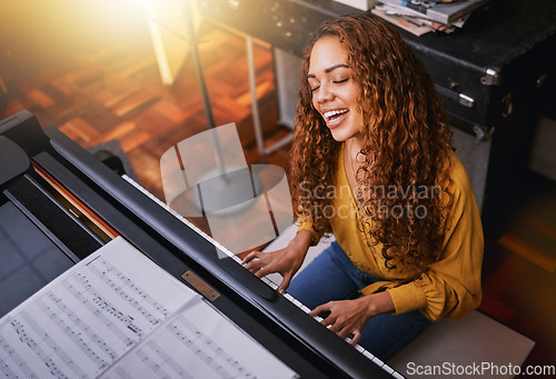 Image of Musician, piano or singing woman in studio album recording, night performance or theatre practice for jazz label industry. Smile, happy or singer and pianist instrument for creative radio in top view