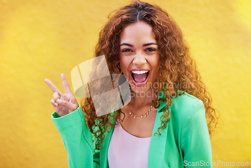 Image of Woman, peace and portrait on yellow background, color backdrop and mockup space. Happy female, v sign and hands of cool model for victory, smile and fun mood with happiness, mock up and gen z fashion