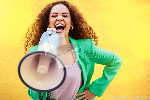 Image of Woman, megaphone and protest on yellow background of speech, announcement and screaming noise. Female broadcast voice for human rights, justice and news for attention, opinion and gen z speaker sound