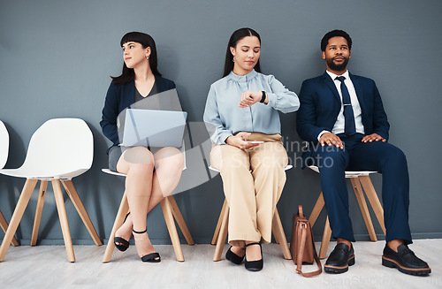 Image of Recruitment, job interview and time with business people in waiting room for schedule, hr or consulting. Hiring, networking and clock with employee for search, countdown or watch with wall background
