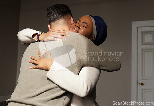 Image of Hug, support and woman embrace a man for comfort, grief and care after bad news or problems in a home or house. Cancer, sad and depression by people hugging for empathy, love and hope together