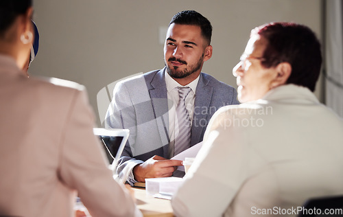 Image of Teamwork, people in meeting or lawyer for court case planning, strategy discussion or communication in office. Law firm, corporate or collaboration for evidence review, legal conversation or report