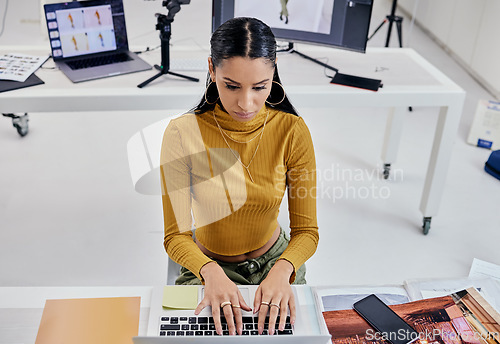 Image of Photography editing, creative typing and woman working on web software for photo edit. Media, fashion photographer and photoshoot planning of a female studio employee doing computer work for press