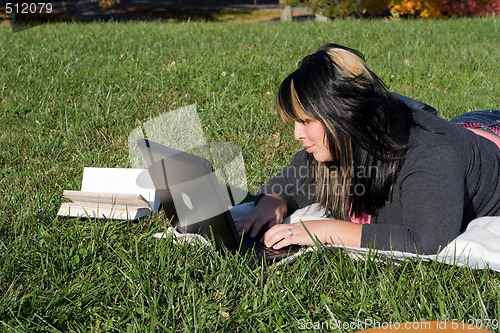 Image of Girl Using a Laptop