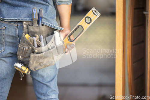 Image of Maintenance man, bag and tools with hands, front door and home improvement service in property industry. Construction worker, back and jeans for working at house, building or real estate development