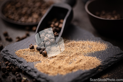 Image of whole and milled black pepper