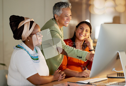 Image of Computer, office and manager training women with research for a corporate company project at night. Management, discussion and woman leader helping female business team work on report in workplace.