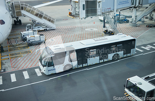 Image of Airport, bus transport and plane on road, runway and park for travel service, fuel and outdoor. Urban bus stop, street and airplane for transportation, logistics and immigration on international jet