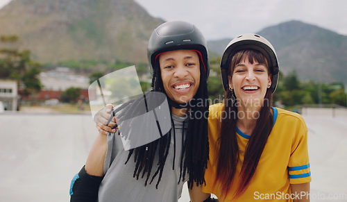Image of Portrait, hug and friends skate in park, smile and helmets for training, fun and cheerful together. Fitness, black man or woman embrace, skating and laughing with hobby, recreation and relax outdoor