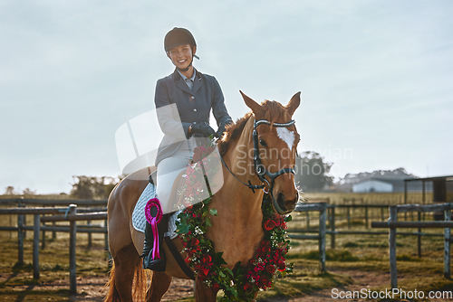 Image of Winner, sports and portrait of woman on horse for a show, recreation and lessons on a farm. Equestrian, award and girl doing horseback riding for a competition, learning or training in countryside