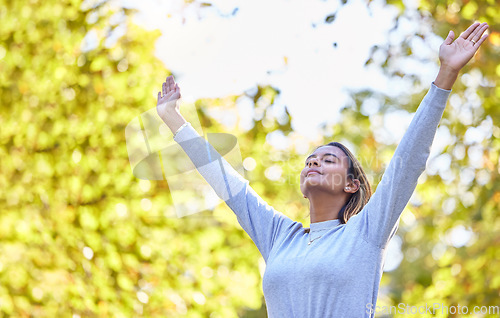 Image of Woman, park and hands open in air for nature, gratitude and self care with mindfulness in sunshine. Gen z girl, stretching and sun worship with gratitude, zen and wellness to start morning with peace