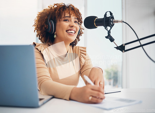 Image of Laptop, microphone and radio with a black woman presenter talking during a broadcast while live streaming. Influencer, talk show and media with a female journalist or host chatting on a mic