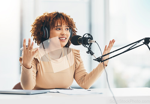 Image of Radio show, podcast and black woman with microphone, talking and live streaming for advice. African American female presenter, lady or influencer with headphones, discussion or broadcast in workplace