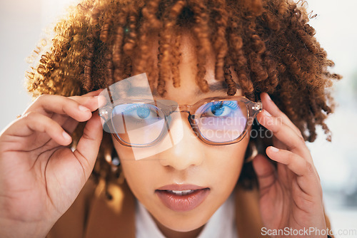 Image of Vision, glasses and black woman, face and portrait with eye care, designer frame with prescription lens. Closeup, optometry and hands holding spectacles with female, fashion and health for eyes