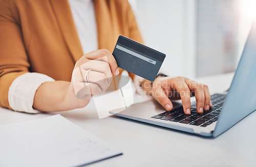 Image of Hands, laptop and office with credit card for black woman, e-commerce and shopping on web with cybersecurity. Corporate executive, computer and ecommerce for sale, discount and fintech at workplace