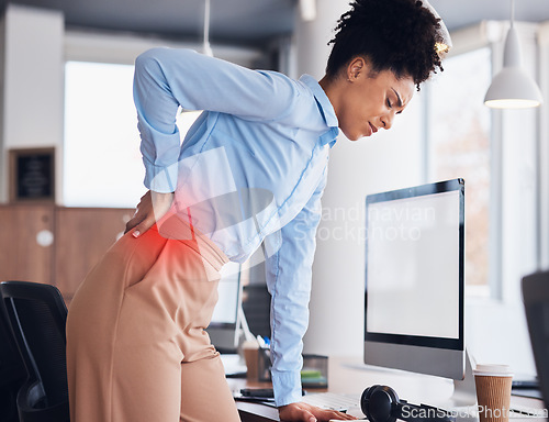 Image of Back pain, office and business black woman with injury, muscle ache and spine problem standing at desk. Medical emergency, stress and tired female worker massage body for strain, tension and accident