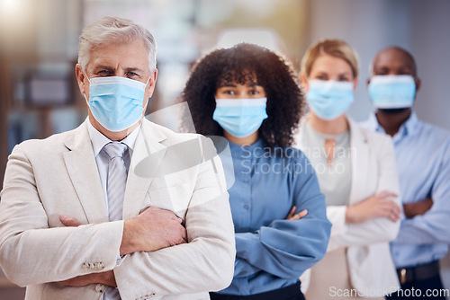 Image of Mask, portrait and business team with arms crossed in office, company compliance and health regulations. Leadership, covid and face of group, employees and corporate diversity for safety management