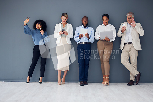 Image of Business people standing in line with technology isolated on wall background for communication and career opportunity. waiting room, diversity and corporate employees on smartphone, laptop and tablet