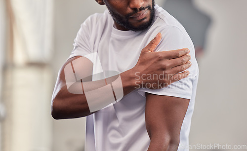 Image of Shoulder pain, fitness and black man with injury in gym after accident, workout or training. Sports, health and male athlete with fibromyalgia, inflammation or arthritis, tendinitis or painful arm.