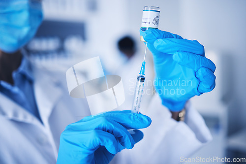 Image of Vaccine, doctor hands and monkeypox injection for safety, healthcare medicine or pharmaceutical laboratory test. Closeup syringe, hands and liquid bottle of virus risk, medical scientist and research