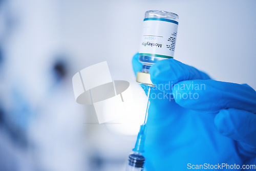 Image of Injection vial, doctor and monkeypox vaccine of safety, healthcare medicine or pharmaceutical laboratory test. Closeup needle, hands and liquid bottle of virus risk, wellness or medical science drugs