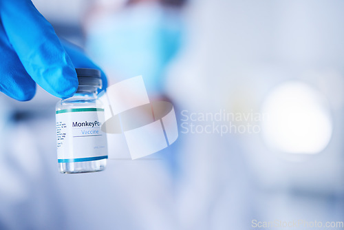 Image of Monkeypox vaccine, doctor and hands of vial for risk, protection and healthcare medicine. Closeup, liquid bottle and vaccination of virus, medical drugs or mockup in pharmaceutical science laboratory